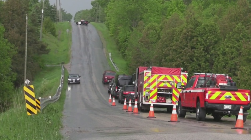 Police and emergency crews investigate reports of a possible body in a creek near Thornton on County Road 21 on Wed., May 23, 2024. (CTV News/Mike Arsalides)