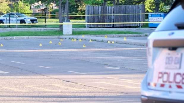 Evidence markers are pictured outside a public school on Montevideo Drive in Mississauga following a shooting Wednesday May 22, 2024. (Simon Sheehan /CP24)
