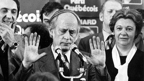 Quebec Premier Rene Levesque tries to hush supporters at a Parti Quebecois rally in Montreal, Nov.15, 1976, following his party's victory over the Liberal party of Robert Bourassa in the provincial election. It was a meaningless mid-November game whose only memorable play occurred in the stands, yet decades later it still illustrates more than any Stanley Cup-winning heroics what the Montreal Canadiens have meant to their city. (THE CANADIAN PRESS/ Files)