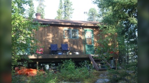 An older picture of Corden's cottage near Cranberry Portage. (Source: John Corden)