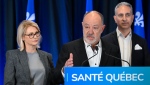 Quebec Health Minister Christian Dube announces the nomination of Genevieve Biron, left, head of Sante Quebec, and Frederic Abergel, head of operations, Monday, April 29, 2024 in Quebec City. (Jacques Boissinot, The Canadian Press)