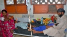 Children, who are suffering from gastroenteritis due to hot weather, receive treatment at a hospital in Hyderabad, Pakistan, May 23, 2024. (AP Photo/Pervez Masih)