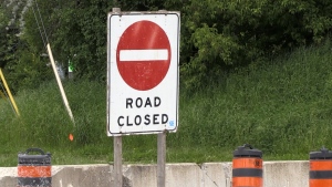 A road closed sign at Edinburgh Road South and College Avenue West in Guelph, Ont. on May 23, 2024. (Colton Wiens/CTV Kitchener)