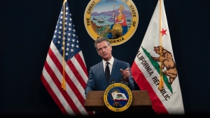 California Gov. Gavin Newsom unveils his revised 2024-25 state budget during a news conference in Sacramento, Calif., Friday, May 10, 2024. (AP Photo/Rich Pedroncelli)
