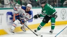 Edmonton Oilers star Connor McDavid looks to pass the puck as Dallas Stars centre Matt Duchene defends during Game 1 of the Western Conference Final in the NHL  playoffs on May 23, 2024, in Dallas. (Tony Gutierrez/Associated Press)