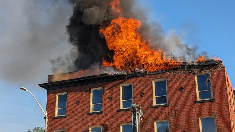 Windsor fire crews battle a blaze in the area of Wyandotte Street and Parent Avenue on May 24, 2024. (Rob Hindi/AM800 News)