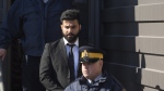 The trucker who caused the horrific Humboldt Broncos bus crash in 2018 will learn Friday whether he is to be deported. Jaskirat Singh Sidhu is taken out of the Kerry Vickar Centre by the RCMP following his sentencing for the Humboldt Broncos bus crash in Melfort, Sask., Friday, March 22, 2019. THE CANADIAN PRESS/Kayle Neis