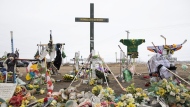 A memorial is displayed for the victims of the Humboldt Broncos bus crash on the corner of highway 35 and highway 335 near Codette, Sask. on Saturday, April, 6, 2019. THE CANADIAN PRESS/Kayle Neis