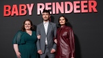 
Richard Gadd, center, the star and creator of "Baby Reindeer," poses with cast members Jessica Gunning, left, and Nava Mau at a photo call for the Netflix miniseries at the Directors Guild of America, Tuesday, May 7, 2024, in Los Angeles. (AP Photo/Chris Pizzello)