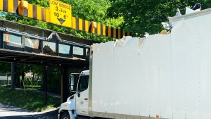 A truck driver in Parry Sound made a mistake when judging bridge height, seriously damaging the truck in the process. (Ontario Provincial Police photo)