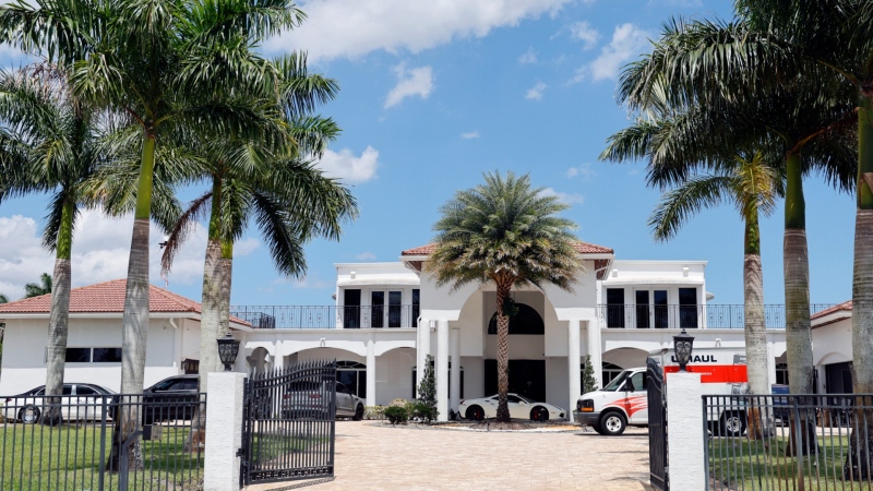 Sean Kingston's Southwest Ranches, Fla., home is shown during a raid by the Broward Sheriff's Office on Thursday, May 23, 2024.  (Amy Beth Bennett/South Florida Sun-Sentinel via AP)