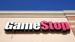 A GameStop sign is displayed above a store, Jan. 28, 2021. (AP Photo/Charlie Neibergall, File)