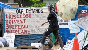 After a month of torrential downpours, blistering heat and two failed attempts to have them removed this past month, pro-Palestinian protesters are still encamped on a part of McGill University’s downtown campus. A pro-Palestinian supporter enters the encampment on McGill University campus, in Montreal, Monday, May 13, 2024. THE CANADIAN PRESS/Ryan Remiorz
