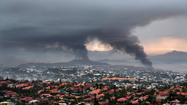 Smoke rises during protests in Noumea, New Caledonia, Wednesday May 15, 2024. (AP Photo/Nicolas Job, File)

