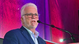 Former Quebec premier Philippe Couillard speaks during a tribute on the tenth anniversary of his election win in 2014, at the Quebec Liberal party general council meeting in Bromont, Que. on Saturday, May 25, 2024. THE CANADIAN PRESS/Patrice Bergeron