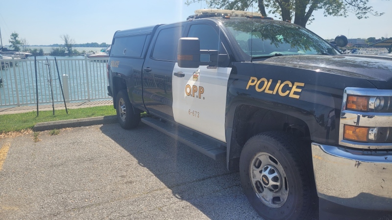 An OPP vehicle is seen at the Belle River Marina on May 26, 2024 where a search is underway for a swimmer who went missing on Lake St. Clair. (Sanjay Maru/CTV News Windsor)