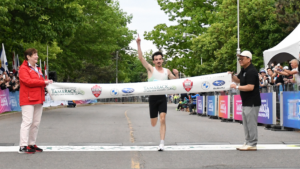 Benjamin Flanagan finishing the men's 10K race, setting a new Canadian record. His time was 28:09. (Courtesy of: Tamarack Ottawa Race Weekend)