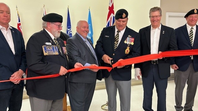 Marc Séguin, Wasaga Beach Legion Branch President cutting the ribbon for the new legion in Wasaga Beach on May 26, 2024 (CTV News/ Mike Lang). 