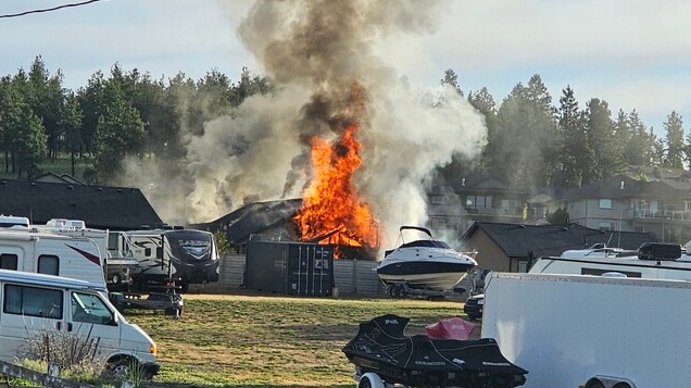 A house fire in Kelowna is pictured on Sunday, May 26. (Courtesy: Castanet/Reilly E)