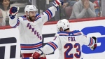 New York Rangers center Barclay Goodrow, left, celebrates his goal with defenseman Adam Fox during Game 3 against the Florida Panthers. (Wilfredo Lee/AP Photo)