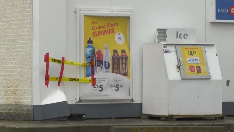 Tape can be seen at an Edmonton gas station where a police officer shot a man on Saturday, May 25, 2024. (Matt Marshall/CTV News Edmonton)