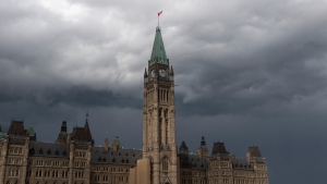 Storm clouds pass by the Peace Tower and Parliament Hill on Tuesday August 18, 2020 in Ottawa. THE CANADIAN PRESS/Adrian Wyld
