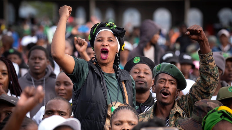 Supporters of Umkhonto weSizwe party react during an election meeting in Mpumalanga, near Durban, South Africa, Saturday, May 25, 2024, in anticipation of the 2024 general elections scheduled for May 29. (AP Photo/Emilio Morenatti)