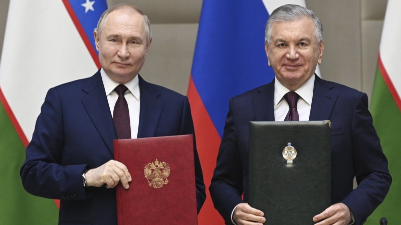 Russian President Vladimir Putin, left, and Uzbek President Shavkat Mirziyoyev on May 27, 2024. (Sergei Bobylev/Kremlin Pool Photo)