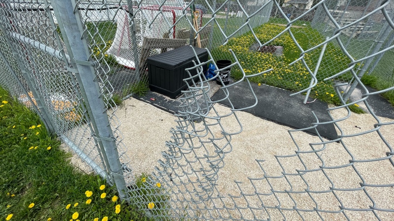 The cut fencing to Norberry-Glenlee Community Centre's batting cage where several items were stolen, including a pitching machine, on May 17, 2024. (Jamie Dowsett/CTV News Winnipeg)