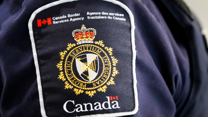 A Canada Border Services Agency patch is seen on an officer in Calgary, Alta., Thursday, Aug. 1, 2019. (The Canadian Press/Jeff McIntosh) 