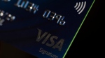 A Visa card is seen in Portland, Ore., Wednesday, May 15, 2024. AP-Jenny Kane