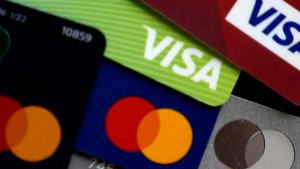 Several credit cards are shown in Buffalo Grove, Ill., Thursday, Feb. 8, 2024. (AP Photo/Nam Y. Huh)