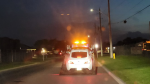 A white vehicle is pictured on the back of a tow truck after Brant Ontario Provincial Police charged a driver with stunt driving in Paris, Ont. (Submitted: OPP)