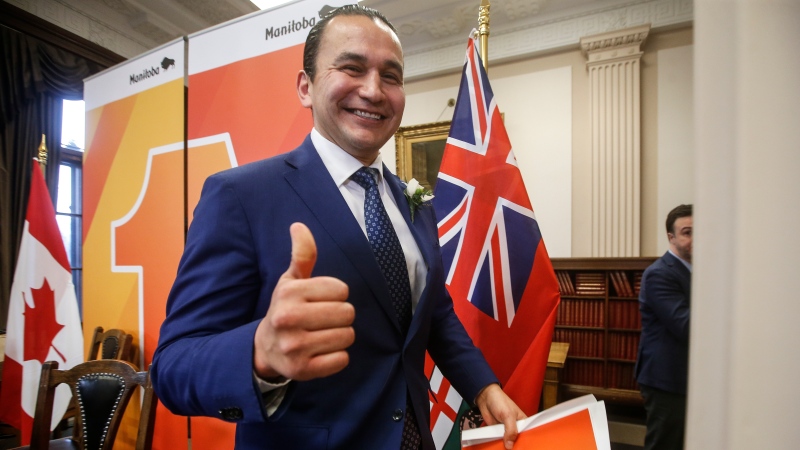 Manitoba Premier Wab Kinew gives a thumbs-up after he leaves a press conference before the provincial budget is read at the Manitoba Legislature in Winnipeg, Tuesday, April 2, 2024. (john Wood/The Canadian Press)