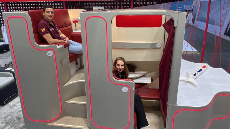 The Chaise Longue airplane seat -- designed by Alejandro Nunez Vicente, pictured left, is back. Nunez Vicente is now showcasing a premium cabin concept. (Francesca Street/CNN via CNN Newsource)
