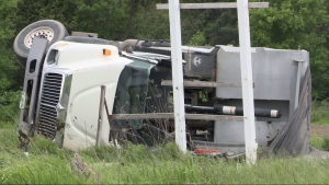 A dump truck crashed into a ditch on Bankfield Road in Ottawa May 28, 2024. Ottawa firefighters extricated the driver, who was pinned under the steering wheel. (Brad Quinn/CTV News Ottawa)
