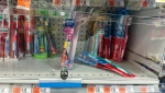 Toothbrushes are for sale behind locked, transparent, protective plastic to prevent shoplifters from stealing the products at a Duane Reade convenience store in the Manhattan borough of New York on Wednesday, January 31, 2024. (AP Photo/Ted Shaffrey)