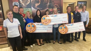 There were plenty of smiles in Greater Sudbury, Ont., on Tuesday morning as local Tim Hortons franchises handed over proceeds from their recent Smile Cookie Campaign to three local charities. (Alana Everson/CTV News Northern Ontario)