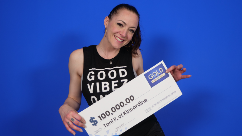 Toni Pendergast of Kincardine, Ont. won $100,000 by playing OLG’s Instant Gold Pursuit. (Source: OLG) 