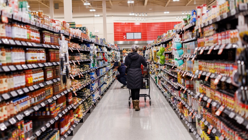 A customer browses an aisle at a Metro grocery store In Toronto on Friday, Feb. 2, 2024. THE CANADIAN PRESS/Cole Burston