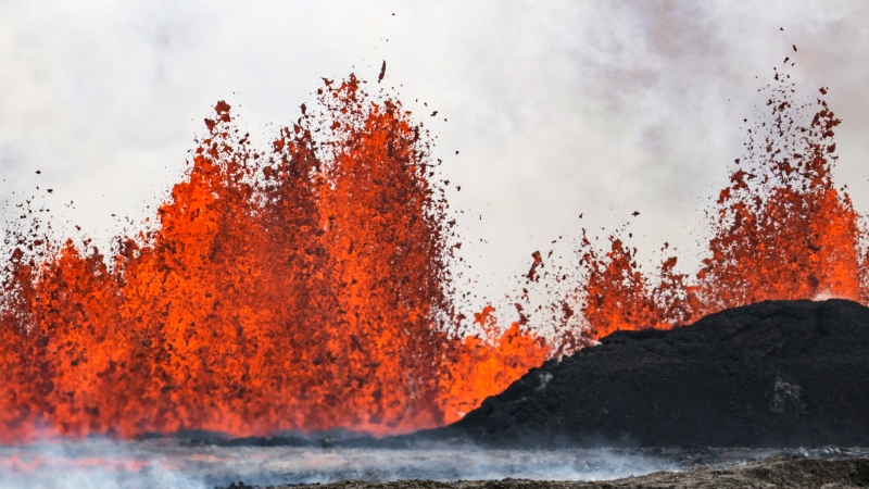 A volcano spews lava in Grindavik, Iceland, Wednesday, May 29, 2024. AP Photo/Marco di Marco)