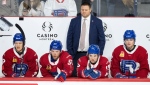 Laval Rocket head coach Jean-François Houle looks on during the second period of an American Hockey League game at Place Bell in Laval, Wednesday, March 13, 2024. (Christinne Muschi / the Canadian Press)