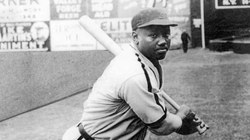 Josh Gibson, catcher for the Negro League Homestead Grays of Pittsburgh, practices his swing before a game at Forbes Field in 1940. (Mark Rucker / Transcendental Graphics / Getty Images via CNN Newsource)