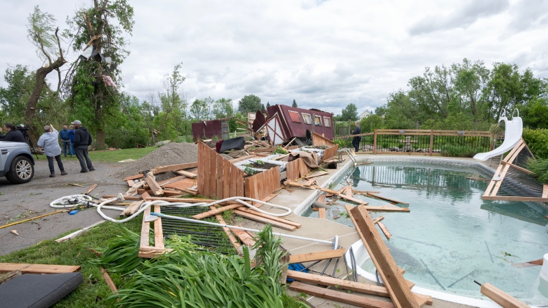 Weather damage is seen in Tres-Saint-Redempteur, Quebec, on Tuesday, May 28, 2024. Environment Canada says the tornado that hit west of Montreal on Monday generated maximum wind speeds of about 155 kilometres per hour. THE CANADIAN PRESS/Ryan Remiorz
