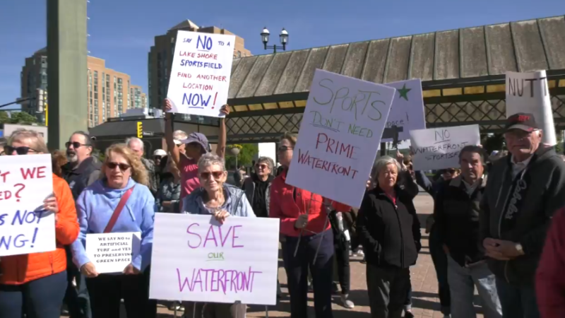 Opposing residents rally outside Barrie City Hall following approval of new multi-purpose field on May 29, 2024. 