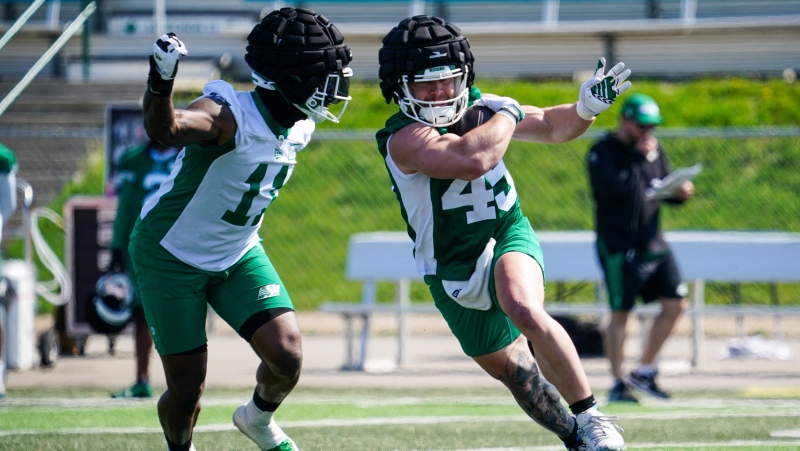Running back A.J. Ouellette (45) runs with the football during the first day of Saskatchewan Roughriders spring training camp in Saskatoon, Sask., Sunday, May 12, 2024. THE CANADIAN PRESS/Heywood Yu