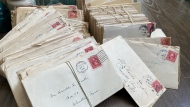 Jay Preseau's stacks of 1920s love letters are shown in an undated photo. (Jay Preseau)