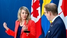 Canada's Foreign Minister Mélanie Joly, left, and Sweden's counterpart Tobias Billström hold a joint news conference on, among other things, the security situation, current NATO issues, and Sweden and Canada's bilateral relationship, in Stockholm, Sweden, May 29, 2024. (Anders Wiklund/TT News Agency via AP)