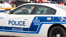 Montreal police patrol car (Christinne Muschi/The Canadian Press)