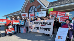 Around 40 protesters gather at the Barrie South GO Train station in Barrie, Ont., on Thurs., May 30, 2024, to head to a rally at Queen's Park. (CTV News/Mike Lang)
